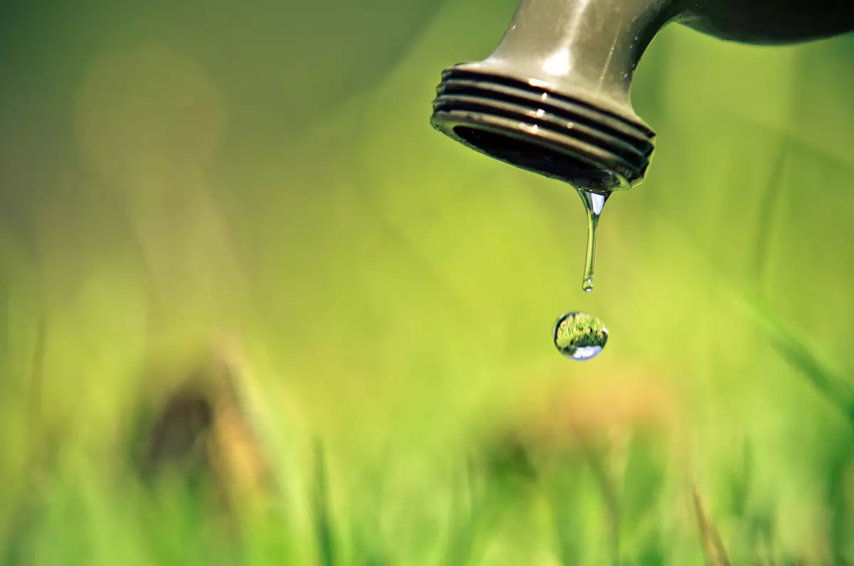 Water Dripping from Garden Faucet